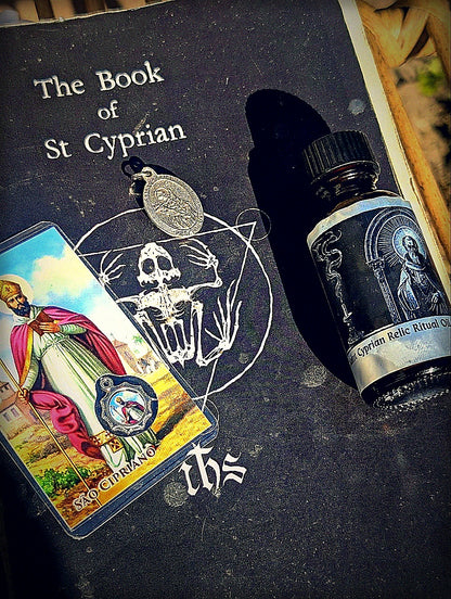 Feast Day Bundle: Saints Cyprian and Justina with oil, medal, prayer card, and Book of Saint Cyprian